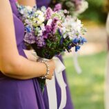 purple bridesmaids dresses at river farm