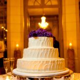 butter cream cake with purple flowers