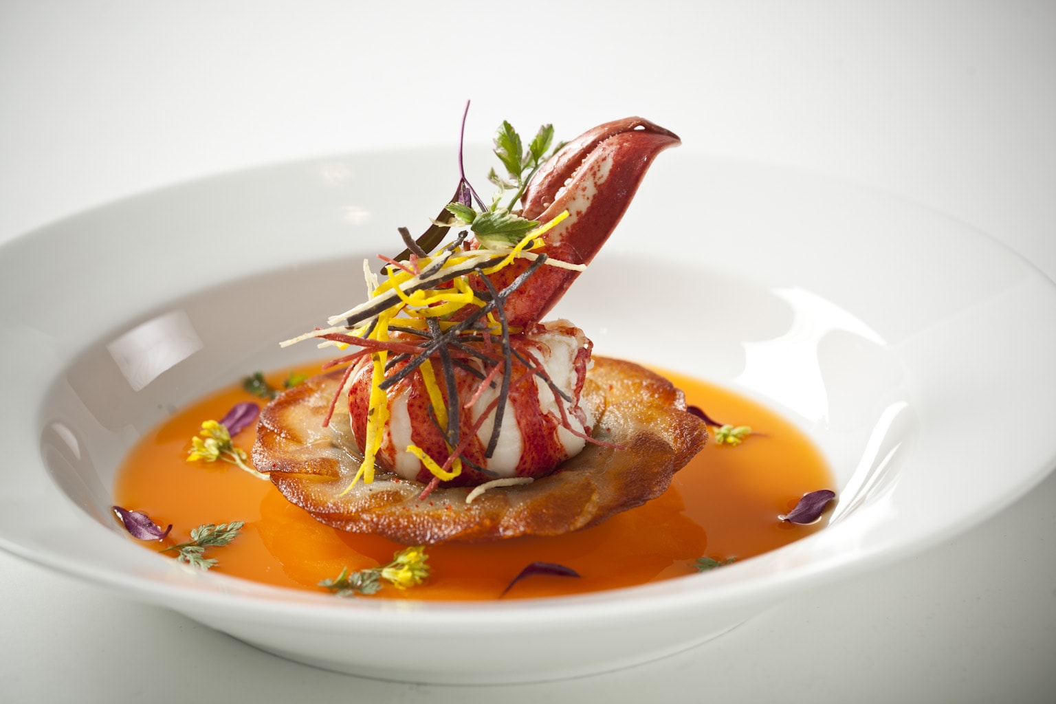Maine Lobster with Potato Galette and Lobster Reduction
