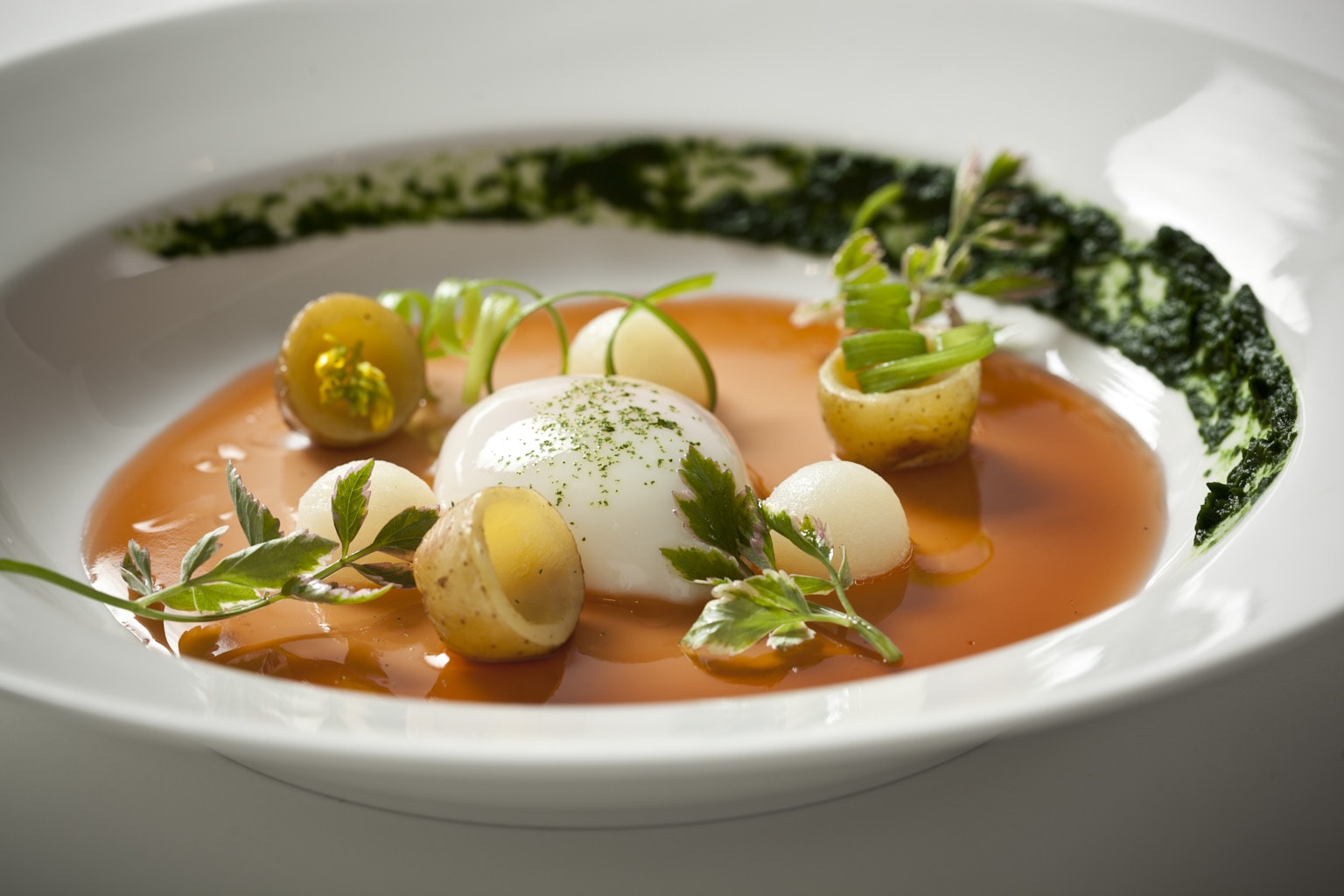 Sous Vide Poached Organic Duck Egg with Pee Wee Potato, Truffle Broth