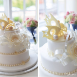 white wedding cake with choclate fish