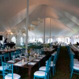 long tables under tent